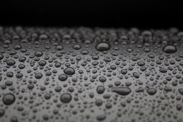 Drops of water on the surface of plastic pipe..