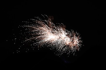 Bonfire celebration fireworks lighting up the skies 