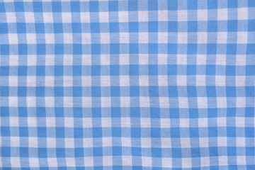 Checkered blue and white texture. Close-up. Fashion concept