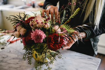 Woman Arranging Flowers
