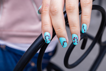 nail art manicure with colorful polish nails. Beauty hand and stylish nails.
