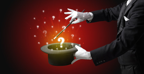White gloves from a cylinder conjure lighting question signs