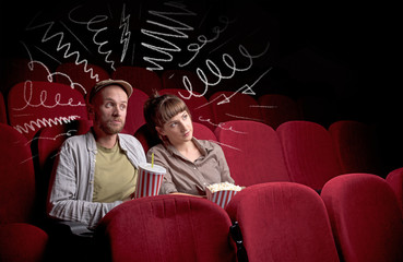 Young cute couple sitting in cinema, and eating popcorn while watching movie with doodle graphics