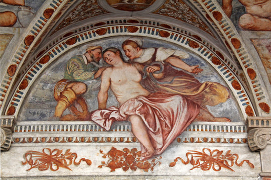 il suicidio di Cleopatra: affresco del Romanino  nella loggia del cortile dei Leoni; Castello del Buonconsiglio, Trento