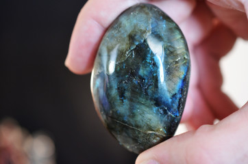 Labradorite Palm Stone! Polished Labradorite stone. Iridescent coloring, very reflective and...