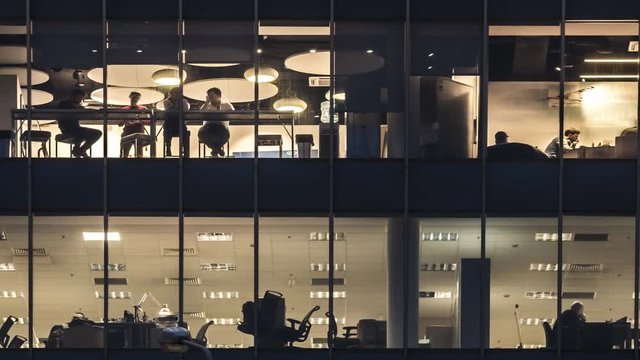 creative office workers during operation and at the end of working day, time lapse