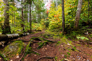 Fall colors of Lac Legault with Mont Kaaikop in the background, in cottage country in the Laurentians, Quebec, Canada.