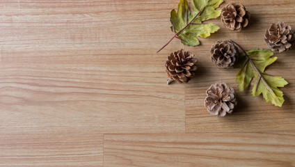 pine cones on wooden background