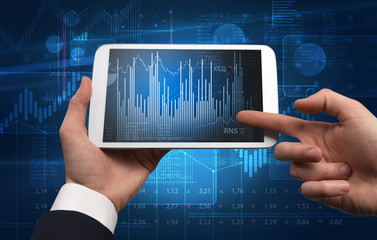 First person hand using tablet and checking financial report on cloud computing system
