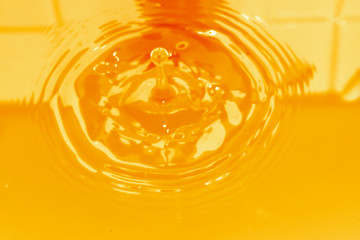 liquid splash orange and background