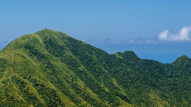 Timelapse of Keelung mountain in New Taipei city. Beauty Hyperlapse of landscape of green mountains with blue sky. Scenic of journey tourism in a beautiful day of summer in Jishan, Ruifang-Dan