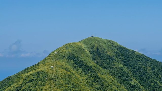 Timelapse of Keelung mountain in New Taipei city. Beauty Hyperlapse of landscape of green mountains with blue sky. Scenic of journey tourism in a beautiful day of summer in Jishan, Ruifang-Dan
