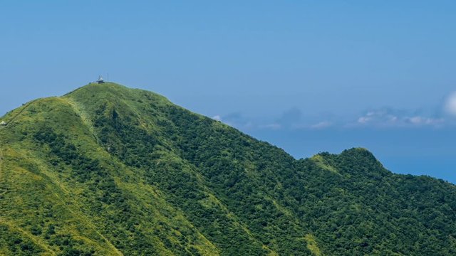 Timelapse of Keelung mountain in New Taipei city. Beauty Hyperlapse of landscape of green mountains with blue sky. Scenic of journey tourism in a beautiful day of summer in Jishan, Ruifang-Dan