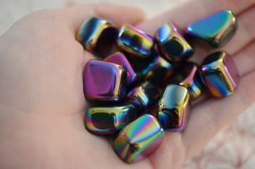 Polished Rainbow Hematite. Rainbow Hematite. Iridescent polished crystals. Protective stone. Rainbow Sparkly Healing Crystal, Bohemian Decor, Interior Design - obrazy, fototapety, plakaty