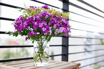 A Flower Arrangement on a Balcony