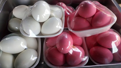 Duck egg ...white and pink ready to eat it.Different colors are different flavors.Clean plastic...