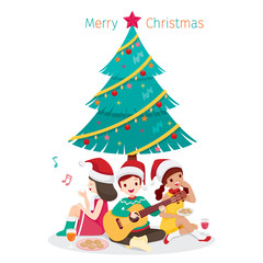Obraz premium Children Sitting Under Christmas Tree, Playing Guitar, Singing and Eating on Holiday Party at Home,New Year, Xmas, Festive, Celebrations