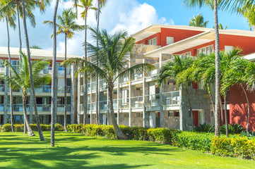 Buildings among palm trees in the resort of Punta Cana.