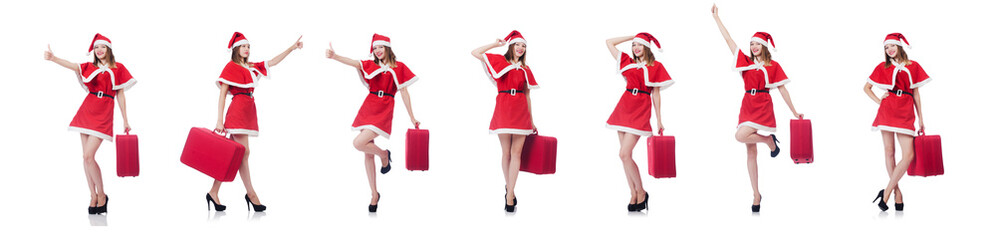 Young woman in red santa costume with suitcase