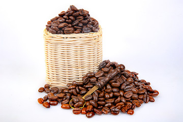 coffee beans in a wicker basket isolated