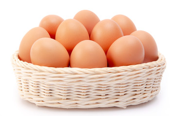 Brown Eggs  in basket Isolated at White Background