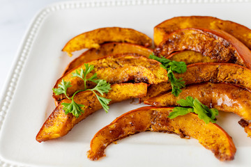 Close up plate of roasted pumpkin slices