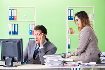 Two colleagues working in the office