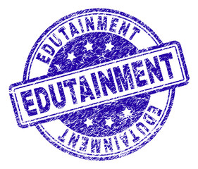 EDUTAINMENT stamp seal imprint with grunge texture. Designed with rounded rectangles and circles. Blue vector rubber print of EDUTAINMENT tag with unclean texture.