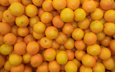 a bunch of fresh ripe tangerines