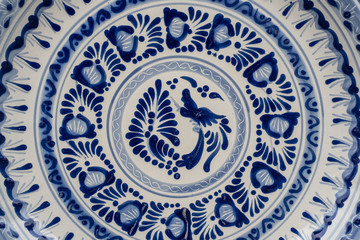mexican designs talavera poblana colorful backgrounds with graphics of mexico flowers pigeons porcelain ceramics embossed traditional crafts culture folklor
