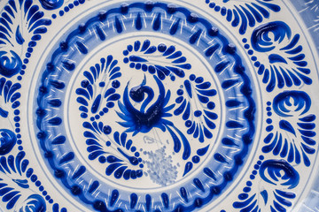 mexican designs talavera poblana colorful backgrounds with graphics of mexico flowers pigeons porcelain ceramics embossed traditional crafts culture folklor
