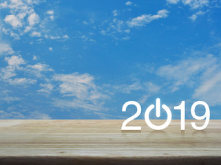 2019 start up business flat icon on wooden table over blue sky with white clouds, Happy new year greeting card concept