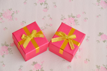 gift box with red ribbon and bow