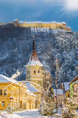 Obraz premium Landscape with Rasnov town and medieval fortress, Brasov, Transylvania, Romania