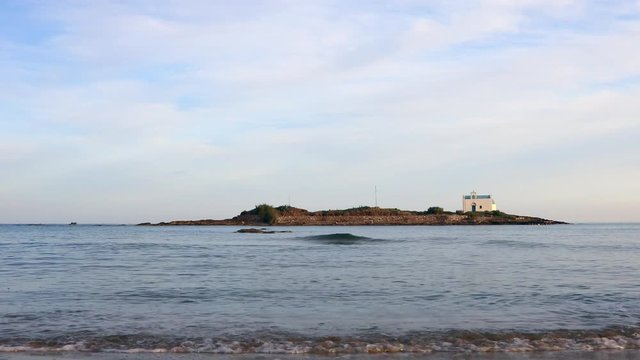 Beautiful chapel and island of Afentis Christos. Located close to Malia on the island of Crete in Greece, Europe.