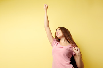 Happy girl in the pink t-shirt