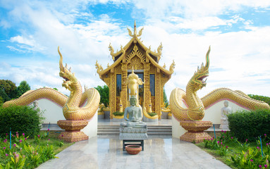 Beautiful thai temple with blue sky background. - obrazy, fototapety, plakaty