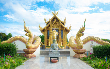 Beautiful thai temple with blue sky background.