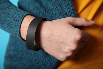 Concert wristband mockup, black hospital bracelet design. Arm adhesive, carpus paper accessory.