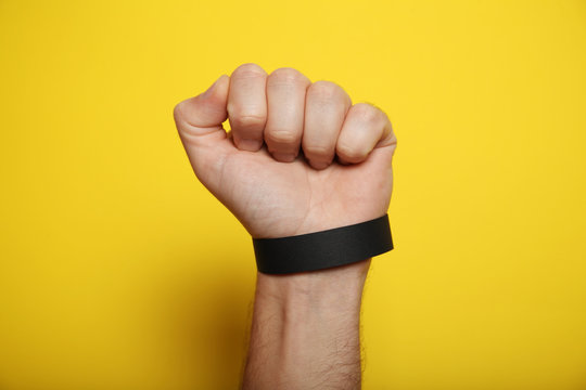 Concert black paper bracelet mockup, event wristband. Arm activity accessory, adhesive, cheap.