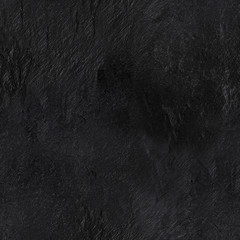 Un motif harmonieux d& 39 un arrière-plan abstrait en ardoise noire, une texture sombre avec une place pour le texte, une impression de répétition en pierre