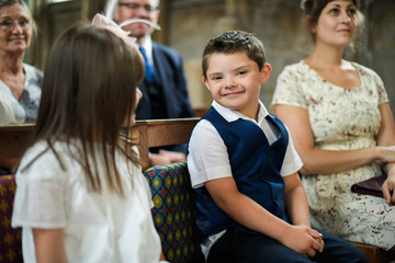 Cute little boy waiting for the bride to arrive