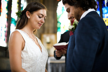 Bride and groom at the altar