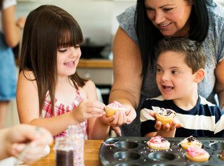 Family with fresh homemade cucakes