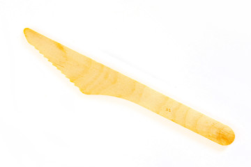 Wooden knife on white background