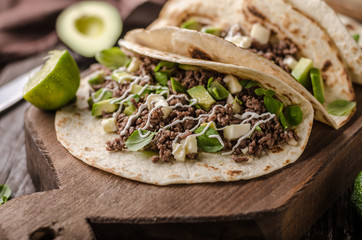 Homemade minced beef tortilla, fresh avocado and mozarella cheese