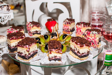 Sweet cakes on the glass tray