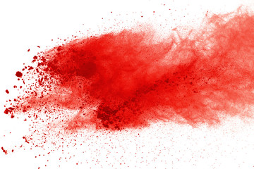 Red powder explosion on white background. Paint Holi.