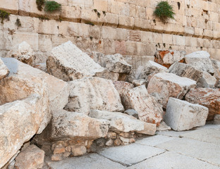 closeup of stones thrown from the second temple to the street below after the destruction of the temple in 70 CE