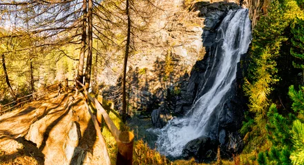 Fototapeten Stunning waterfall into the woods © Massimo De Candido